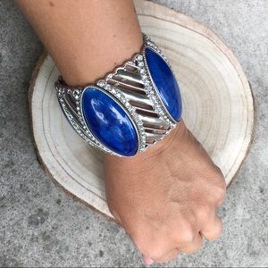 Stretchy blue and silver tone statement bracelet